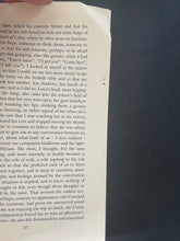 Load image into Gallery viewer, A Heart so White by Javier Marias: photo of page 37 which shows two small punctures along the fore-edge of the page.