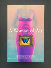 Load image into Gallery viewer, A Woman of Air by Margaret Packham Hargrave: photo of the front cover which shows tiny scuff marks along the edges.