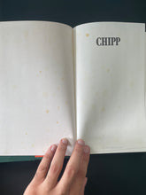 Load image into Gallery viewer, Chipp by Don Chipp: photo of pages 2 and 3 in the book which show small blotches of faint discolouring. The same can be seen on the first page, and the last 2 pages in the book.