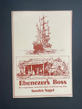 Load image into Gallery viewer, Book cover of 'Ebenezer's Boss' by Sandra Nagel with ship and pioneer village illustration on a dark background. The photo shows very minor scuff marks along the edges.