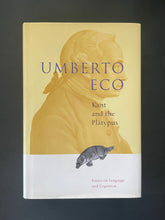 Load image into Gallery viewer, Kant and the Platypus by Umberto Eco: photo of the front cover which shows very minor scuff marks along the edges of the dust jacket.
