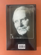 Load image into Gallery viewer, Laurence Olivier by Donald Spoto: photo of the back cover which shows very minor scuff marks along the edges of the dust jacket.