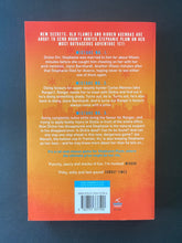 Load image into Gallery viewer, Lean Mean Thirteen by Janet Evanovich: photo of the back cover which shows very, very minor scuff marks along the edges.