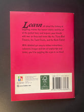 Load image into Gallery viewer, The back cover of 'Learn Juggling by Jaclyn Crupia' which shows very minor, tiny, scuff marks along the edges.