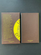 Load image into Gallery viewer, Louis Vuitton City Guide 2012-Hong Kong/Macau: photo of the slip case and back cover.