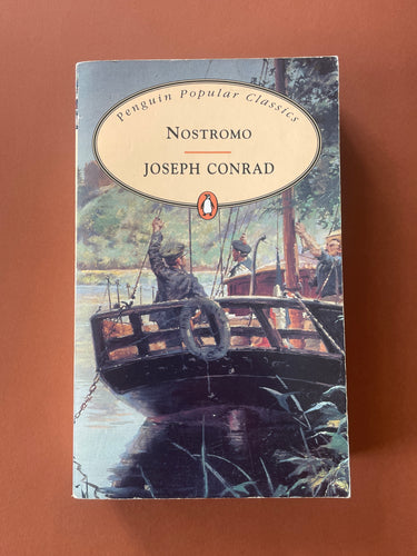 Nostromo by Joseph Conrad: photo of the front cover which shows minor scuff marks and creasing along the edges, and minor scratching.