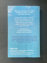 Load image into Gallery viewer, Redhead By the Side of the Road by Anne Tyler: photo of the back cover which shows minor scuff marks.