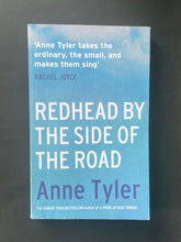 Load image into Gallery viewer, Redhead By the Side of the Road by Anne Tyler: photo of the front cover which shows minor scuff marks.