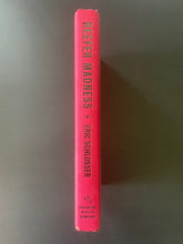Load image into Gallery viewer, Reefer Madness by Eric Schlosser: photo of the spine which shows very, very minor scuff marks along the edges.