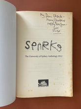 Load image into Gallery viewer, Sparks by Mark Tredinnick: photo of the first page in the book which has been inscribed and signed in black pen. And blotches of discolouring around the edges of the page. This first page is by far the worst of the discolouring.