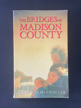 Load image into Gallery viewer, The Bridges of Madison County by Robert James Waller: photo of the front cover which shows minor scuff marks, scratches, and some creasing.