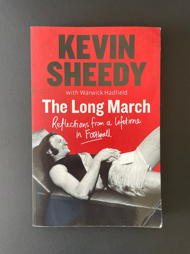 The Long March by Kevin Sheedy: photo of the front cover which shows scuff marks and creasing.