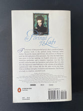Load image into Gallery viewer, The Portrait of a Lady by Henry James: photo of the back cover which shows very minor scuff marks along the edges.