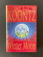 Load image into Gallery viewer, Winter Moon by Dean Koontz: photo of the front cover which shows minor scuff marks on the dust jacket and very minor scratches.