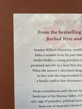 Load image into Gallery viewer, A Bitter Harvest by Peter Yeldham: a close-up photo of the crease on the top-left corner of the back cover.