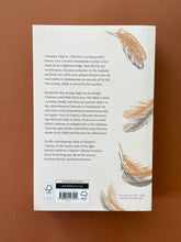 Load image into Gallery viewer, An Orchestra of Minorities by Chigozie Obioma: photo of the back cover which shows very minor (barely visible) scuff marks.