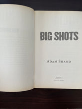 Load image into Gallery viewer, Big Shots by Adam Shand book: photo of the first and title pages, which both have very minor, faint, discolouring around the edges. This same discolouring is also visible on other pages throughout the book.