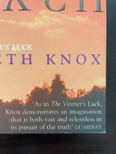 Load image into Gallery viewer, Black Oxen by Elizabeth Knox book: photo of very minor scuff marks along the bottom-right corner of the front cover.