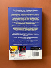 Load image into Gallery viewer, Breaking Vegas by Ben Mezrich: photo of the back cover which shows very minor scuff marks along the edges.

