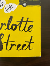 Load image into Gallery viewer, Charlotte Street by Danny Wallace book: photo of very minor scuff mark on the bottom-right corner of the front cover.