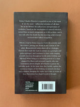 Load image into Gallery viewer, Darwin-A Life in Science by John Gribbin & Michael White: photo of the back cover which shows very minor scuff marks along the edges.