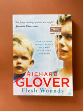 Load image into Gallery viewer, Flesh Wounds by Richard Glover: photo of the front cover which shows very minor scuff marks and obvious creasing along the edges.