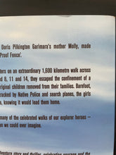 Load image into Gallery viewer, Follow The Rabbit Proof Fence book: photo of a very minor scuff mark at the top of the back cover.