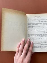 Load image into Gallery viewer, Forgetfulness by Ward Just: photo of the inside of the front cover which shows considerable yellowing due to age.