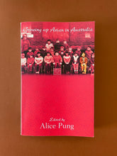 Load image into Gallery viewer, Growing Up Asian in Australia by Alice Pung: photo of the front cover which shows very minor scuff marks and creasing along the edges.