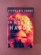 Load image into Gallery viewer, In Mortal Hands by Stephanie Cooke: photo of the front cover which shows very minor scuff marks along the edges.