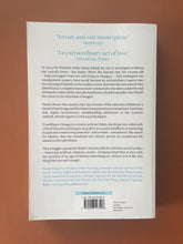 Load image into Gallery viewer, In the Darkroom by Susan Faludi: photo of the back cover which shows very minor scuff marks along the edges.