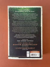 Load image into Gallery viewer, Lethal White by Robert Galbraith: photo of the back cover which shows very minor scuff marks along the edges.