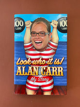 Load image into Gallery viewer, Look Who it is! My Story by Alan Carr: photo of the front cover which shows minor scuff marks along the edges of the dust jacket.