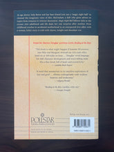 Load image into Gallery viewer, Magic Eight Ball by Marion Douglas book: photo of the back cover, which shows very minor scuff marks along the edges.