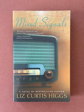 Load image into Gallery viewer, Mixed Signals by Liz Curtis Higgs: photo of the front cover which shows very minor (barely visible) scuff marks along the edges.