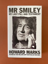 Load image into Gallery viewer, Mr Smiley by Howard Marks: photo of the front cover which shows very minor scuff marks along the edges of the dust jacket.