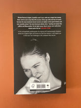 Load image into Gallery viewer, My Fight Your Fight by Ronda Rousey: photo of the back cover which shows obvious creasing on the top-left corner.