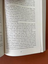 Load image into Gallery viewer, Napoleon's Last Island by Tom Keneally: photo of page 87 which has a very small tear on the bottom-right corner.