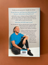 Load image into Gallery viewer, Not a Life Coach by James Smith: photo of the back cover which shows very minor (barely visible) scuff marks along the edges.