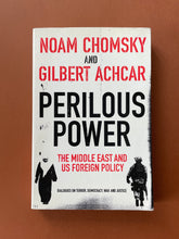 Load image into Gallery viewer, Perilous Power by Noam Chomsky, Gilbert Achcar: photo of the front cover which shows very minor scuff marks along the edges.