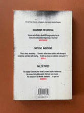 Load image into Gallery viewer, Perilous Power by Noam Chomsky, Gilbert Achcar: photo of the back cover which shows very minor scuff marks along the edges.