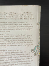 Load image into Gallery viewer, Something To Tell You by Hanif Kureishi book: photo of very minor cuff marks along the top-right corner of the front cover. There is also a very thin sliver of discolouring visible along the top-edge.