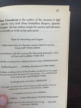 Load image into Gallery viewer, Street Boys by Lorenzo Carcaterra book: photo of the first page. There is a small E written in pen at the top-right corner of the page.
