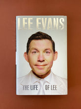 Load image into Gallery viewer, The Life of Lee by Lee Evans: photo of the front cover which shows very minor scuff marks along the edges of the dust jacket.