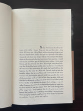 Load image into Gallery viewer, The Long Rain by Peter Gadol book: photo of the very minor crease running down the middle of the page. Barely noticeable here, and even less so on the following pages.