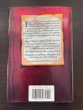 Load image into Gallery viewer, The Long Rain by Peter Gadol book: photo of the back cover. There are minor scuff marks visible along the edges of the dust jacket, some of which cause the edges to curve upwards very slightly.