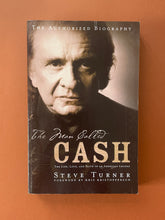 Load image into Gallery viewer, The Man Called Cash by Steve Turner: photo of the front cover which shows minor scuff marks along the edges.