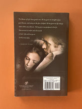 Load image into Gallery viewer, The Man Called Cash by Steve Turner: photo of the back cover which shows very minor (barely visible) scuff marks along the edges.