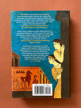 Load image into Gallery viewer, The Pericles Commission by Gary Corby: photo of the back cover which shows very minor (barely visible) scuff marks along the edges of the dust jacket.
