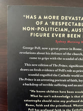 Load image into Gallery viewer, The Prince by David Marr book: photo of very minor scuff mark on the top-left corner of the back cover.